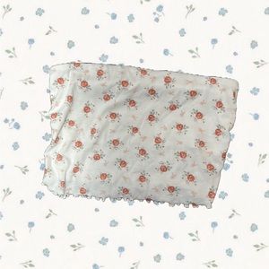 Floral Playboy tube top.